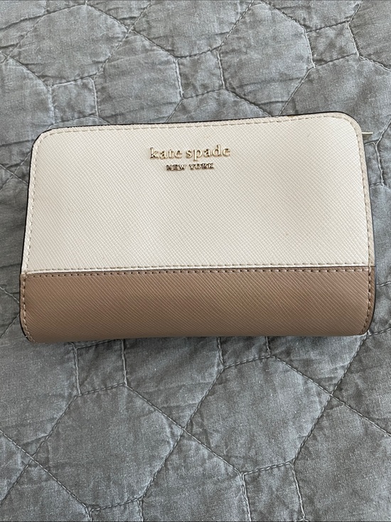 kate spade Handbags - kate spade two-tone cream and tan zip-around wallet